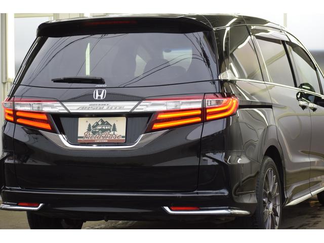 オデッセイ 2.4アブソルートEXホンダセンシング 4WD 4WD ハーフレザー/マルチビューモニター/フリップダウンモニター/パワーシート/大型アームレスト/ETC車載器/両側パワースライドドア/革巻きステアリング/ENKEI18インチアルミ(27枚目)