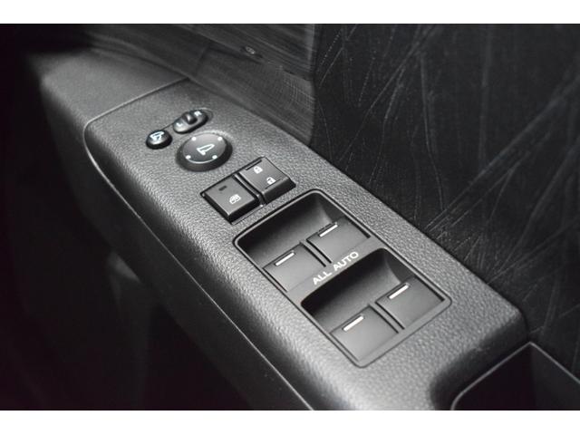 オデッセイ 2.4アブソルートEXホンダセンシング 4WD 4WD ハーフレザー/マルチビューモニター/フリップダウンモニター/パワーシート/大型アームレスト/ETC車載器/両側パワースライドドア/革巻きステアリング/ENKEI18インチアルミ(64枚目)