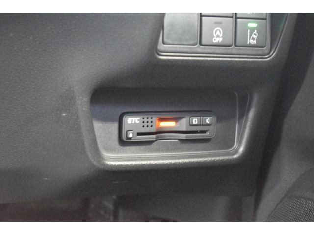 オデッセイ 2.4アブソルートEXホンダセンシング 4WD 4WD ハーフレザー/マルチビューモニター/フリップダウンモニター/パワーシート/大型アームレスト/ETC車載器/両側パワースライドドア/革巻きステアリング/ENKEI18インチアルミ(65枚目)