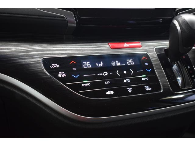 オデッセイ 2.4アブソルートEXホンダセンシング 4WD 4WD ハーフレザー/マルチビューモニター/フリップダウンモニター/パワーシート/大型アームレスト/ETC車載器/両側パワースライドドア/革巻きステアリング/ENKEI18インチアルミ(71枚目)