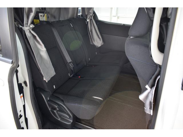 ヴォクシー キャンピング　４ＷＤ　４ＷＤ　５人乗りキャンピング／外部電源／ＦＦヒーター／走行充電／回転シート／ベットキット／サブバッテリー／インバーター／純正エンジンスターター／バックカメラ／遮光カーテン／ポータブル冷蔵庫（63枚目）