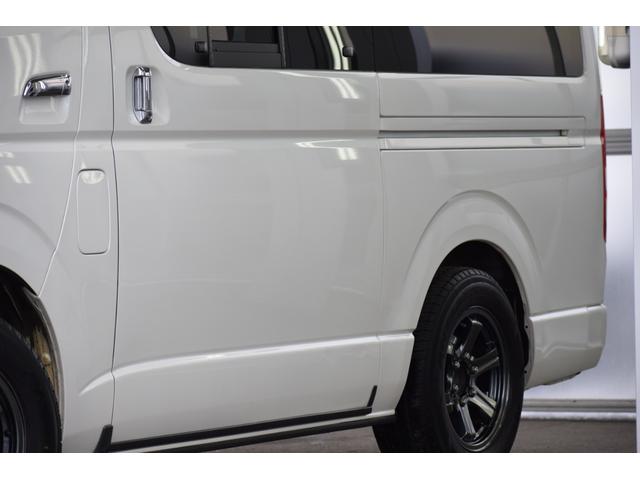 ハイエースバン ロングワイドスーパＧＬマルチロルトランスポタタイプＩＩ　４ＷＤ　３型モデル／モデリスタＭＲＴタイプ２／ロンリュームフロア／収納ＢＯＸ付フルトリム／ベッドキット／純正エンジンスターター社外アルミホイール／純正ＳＤナビＴＶ／バックカメラ／キセノン／ＬＥＤフォグ（2枚目）