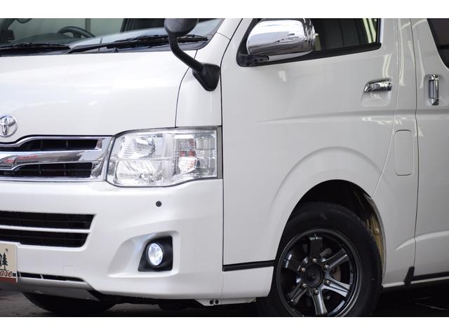 ハイエースバン ロングワイドスーパＧＬマルチロルトランスポタタイプＩＩ　４ＷＤ　３型モデル／モデリスタＭＲＴタイプ２／ロンリュームフロア／収納ＢＯＸ付フルトリム／ベッドキット／純正エンジンスターター社外アルミホイール／純正ＳＤナビＴＶ／バックカメラ／キセノン／ＬＥＤフォグ（4枚目）