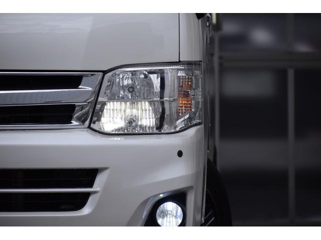 ハイエースバン ロングワイドスーパＧＬマルチロルトランスポタタイプＩＩ　４ＷＤ　３型モデル／モデリスタＭＲＴタイプ２／ロンリュームフロア／収納ＢＯＸ付フルトリム／ベッドキット／純正エンジンスターター社外アルミホイール／純正ＳＤナビＴＶ／バックカメラ／キセノン／ＬＥＤフォグ（6枚目）