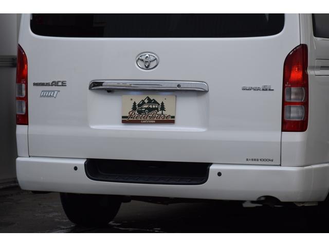 ハイエースバン ロングワイドスーパＧＬマルチロルトランスポタタイプＩＩ　４ＷＤ　３型モデル／モデリスタＭＲＴタイプ２／ロンリュームフロア／収納ＢＯＸ付フルトリム／ベッドキット／純正エンジンスターター社外アルミホイール／純正ＳＤナビＴＶ／バックカメラ／キセノン／ＬＥＤフォグ（29枚目）