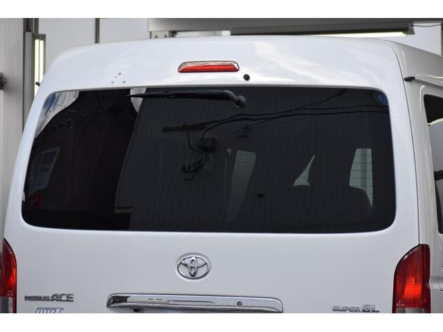 ハイエースバン ロングワイドスーパＧＬマルチロルトランスポタタイプＩＩ　４ＷＤ　３型モデル／モデリスタＭＲＴタイプ２／ロンリュームフロア／収納ＢＯＸ付フルトリム／ベッドキット／純正エンジンスターター社外アルミホイール／純正ＳＤナビＴＶ／バックカメラ／キセノン／ＬＥＤフォグ（30枚目）
