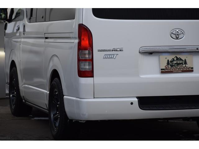 ハイエースバン ロングワイドスーパＧＬマルチロルトランスポタタイプＩＩ　４ＷＤ　３型モデル／モデリスタＭＲＴタイプ２／ロンリュームフロア／収納ＢＯＸ付フルトリム／ベッドキット／純正エンジンスターター社外アルミホイール／純正ＳＤナビＴＶ／バックカメラ／キセノン／ＬＥＤフォグ（33枚目）