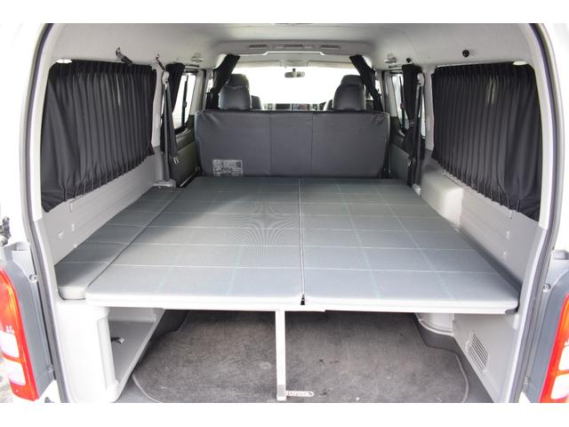 ハイエースバン ロングワイドスーパＧＬマルチロルトランスポタタイプＩＩ　４ＷＤ　３型モデル／モデリスタＭＲＴタイプ２／ロンリュームフロア／収納ＢＯＸ付フルトリム／ベッドキット／純正エンジンスターター社外アルミホイール／純正ＳＤナビＴＶ／バックカメラ／キセノン／ＬＥＤフォグ（44枚目）