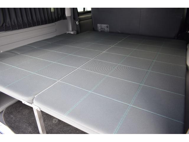 ハイエースバン ロングワイドスーパＧＬマルチロルトランスポタタイプＩＩ　４ＷＤ　３型モデル／モデリスタＭＲＴタイプ２／ロンリュームフロア／収納ＢＯＸ付フルトリム／ベッドキット／純正エンジンスターター社外アルミホイール／純正ＳＤナビＴＶ／バックカメラ／キセノン／ＬＥＤフォグ（45枚目）