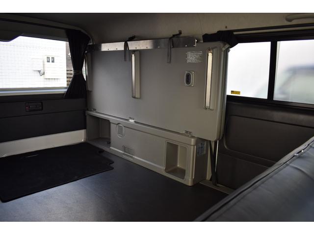 ハイエースバン ロングワイドスーパＧＬマルチロルトランスポタタイプＩＩ　４ＷＤ　３型モデル／モデリスタＭＲＴタイプ２／ロンリュームフロア／収納ＢＯＸ付フルトリム／ベッドキット／純正エンジンスターター社外アルミホイール／純正ＳＤナビＴＶ／バックカメラ／キセノン／ＬＥＤフォグ（58枚目）