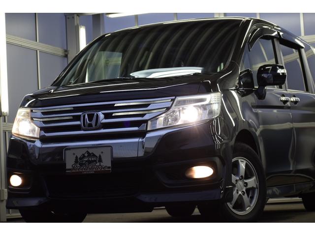 ステップワゴンスパーダ Ｚ　４ＷＤ　９インチ純正ナビ／フリップダウンモニター／バックカメラ／両側パワスラ／ＥＴＣ車載器／イルミネーショングリル／パドルシフト／エンジンスターター／本革巻ステアリング／フットランプ／フルセグテレビ（10枚目）