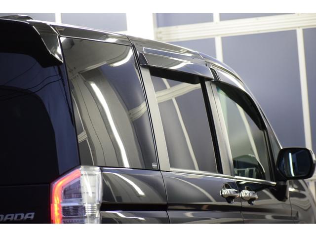 ステップワゴンスパーダ Ｚ　４ＷＤ　９インチ純正ナビ／フリップダウンモニター／バックカメラ／両側パワスラ／ＥＴＣ車載器／イルミネーショングリル／パドルシフト／エンジンスターター／本革巻ステアリング／フットランプ／フルセグテレビ（22枚目）