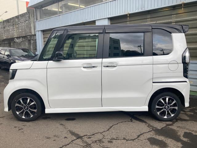 Ｎ－ＢＯＸカスタム Ｇ・Ｌホンダセンシング　４ＷＤ　夏冬タイヤ　純正ＳＤナビ　フルセグ　Ｂｌｕｅｔｏｏｔｈ　クルーズコントロール　バックカメラ　両側パワースライドドア　ＬＥＤヘッドライト　フォグランプ　電動格納ミラー　プッシュスタート　純正ＡＷ（11枚目）