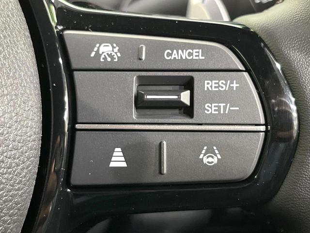 N-BOXカスタム ターボ ターボ 両側電動スライド ホンダセンシング レーダークルーズ 車線逸脱警報 コーナーセンサー LEDヘッド オートハイビーム オートライト ハーフレザーシート 前席シートヒーター スマートキー(4枚目)