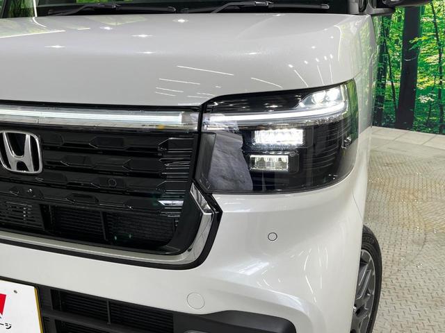 N-BOXカスタム ターボ ターボ 両側電動スライド ホンダセンシング レーダークルーズ 車線逸脱警報 コーナーセンサー LEDヘッド オートハイビーム オートライト ハーフレザーシート 前席シートヒーター スマートキー(11枚目)