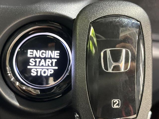 N-BOXカスタム ターボ ターボ 両側電動スライド ホンダセンシング レーダークルーズ 車線逸脱警報 コーナーセンサー LEDヘッド オートハイビーム オートライト ハーフレザーシート 前席シートヒーター スマートキー(62枚目)