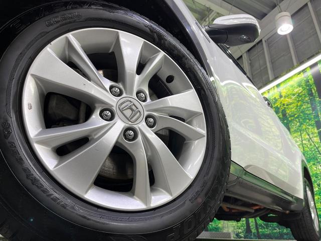 ヴェゼル ハイブリッドＸ　寒冷地仕様　純正ナビ　シティブレーキ　クルーズコントロール　シートヒーター　ＬＥＤヘッドライト　パドルシフト　革巻きステアリング　フロントフォグランプ　オートライト（14枚目）