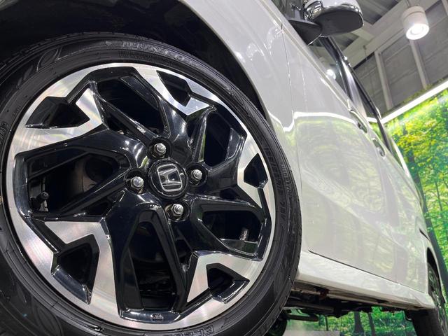Ｎ－ＢＯＸカスタム Ｇ・Ｌターボホンダセンシング　純正９型ナビ　衝突警報装置　アダプティブクルーズ　両側電動ドア　ＬＥＤヘッドライト　シートヒーター　　ハーフレザーシート　パドルシフト　純正１５インチアルミ　革巻きステアリング（12枚目）