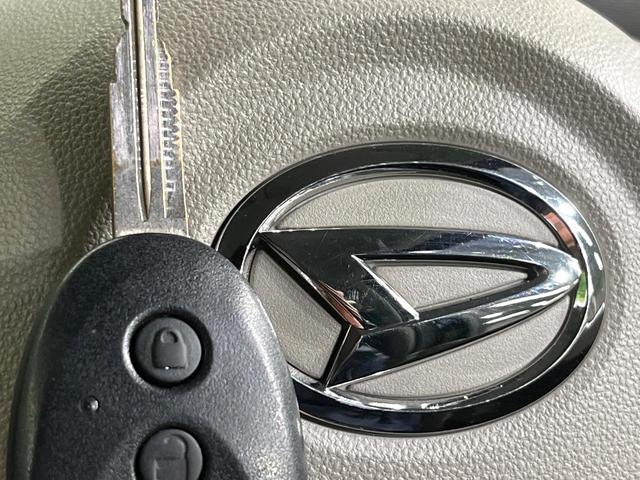 タント Ｌ　オーディオ　アイドリングストップ　シートヒーター　１４インチアルミホイール　ブラックリアスポイラー　アームレスト　エコドライブアシスト　撥水加工ファブリックシート（7枚目）