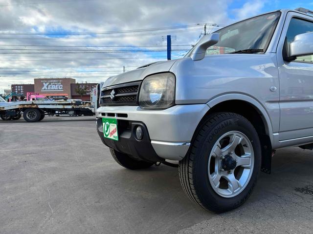 ジムニー ＸＣ　保証２ヵ月２０００ｋｍ　４ＷＤ　ＤＶＤ再生対応フルセグＴＶナビ　エンジンスターター　フロントフォグランプ　電動格納ミラー　ミラーヒーター　キーレスエントリー　アルミホイール　冬タイヤ（2枚目）