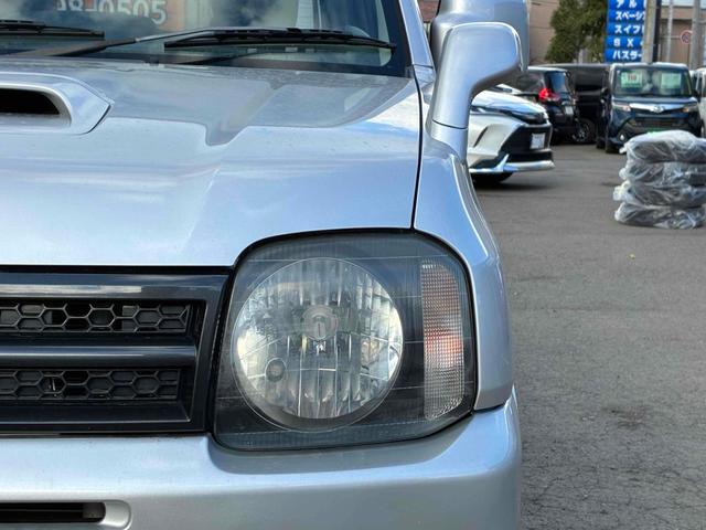 ジムニー ＸＣ　保証２ヵ月２０００ｋｍ　４ＷＤ　ＤＶＤ再生対応フルセグＴＶナビ　エンジンスターター　フロントフォグランプ　電動格納ミラー　ミラーヒーター　キーレスエントリー　アルミホイール　冬タイヤ（22枚目）