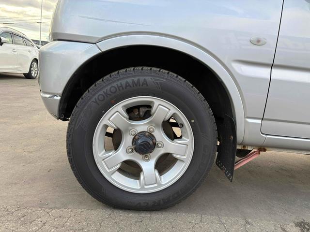 ジムニー ＸＣ　保証２ヵ月２０００ｋｍ　４ＷＤ　ＤＶＤ再生対応フルセグＴＶナビ　エンジンスターター　フロントフォグランプ　電動格納ミラー　ミラーヒーター　キーレスエントリー　アルミホイール　冬タイヤ（53枚目）