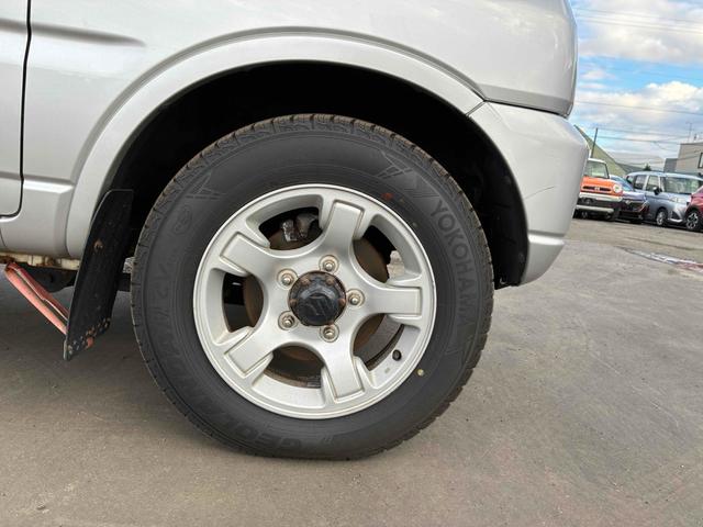 ジムニー ＸＣ　保証２ヵ月２０００ｋｍ　４ＷＤ　ＤＶＤ再生対応フルセグＴＶナビ　エンジンスターター　フロントフォグランプ　電動格納ミラー　ミラーヒーター　キーレスエントリー　アルミホイール　冬タイヤ（56枚目）