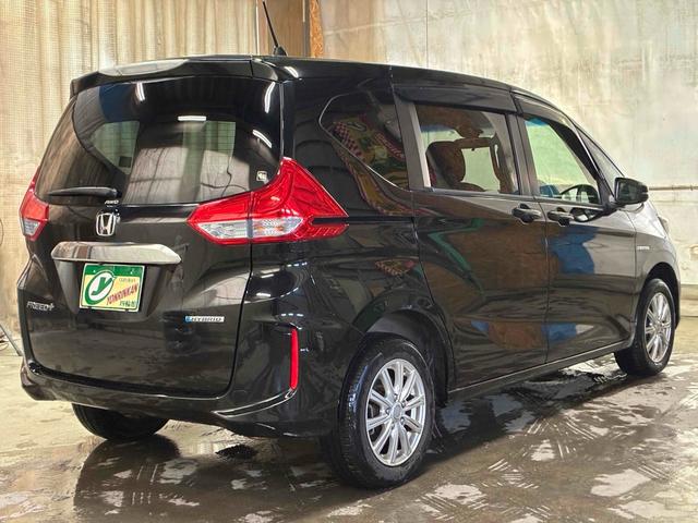 フリード＋ハイブリッド ハイブリッドＧ・ホンダセンシング　保証６ヵ月６０００ｋｍ　１５００ｃｃ　４ＷＤ　Ｂｌｕｅｔｏｏｔｈ接続対応フルセグナビ　バックカメラ　ＥＴＣ　エンジンスターター　フリップダウンモニター　両側電動スライドドア　左右シートヒーター（22枚目）