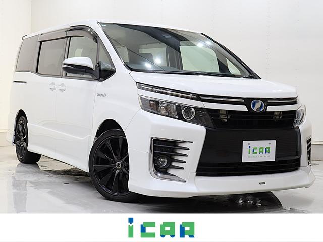 ヴォクシー ハイブリッドZS ワンオーナー車 純正SDナビ 後席モニター トヨタセーフティセンス プリクラッシュセーフティ オートマチックハイビーム レーンディパーチャーアラート バックカメラ ETC リアヒーター 寒冷地仕様車(2枚目)