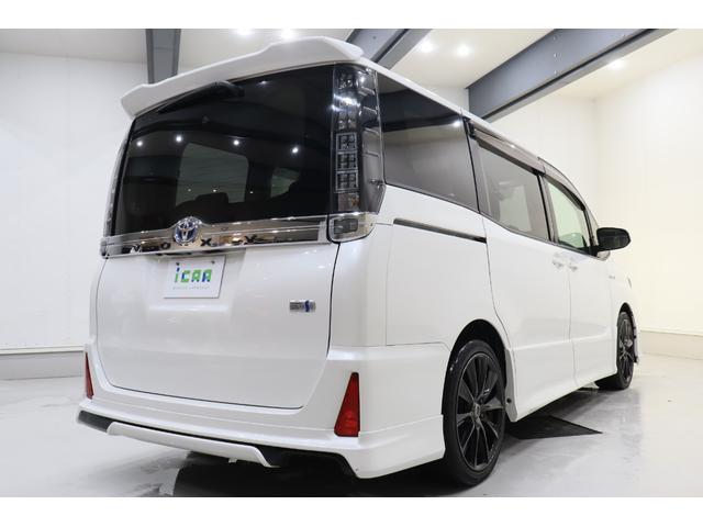 ヴォクシー ハイブリッドZS ワンオーナー車 純正SDナビ 後席モニター トヨタセーフティセンス プリクラッシュセーフティ オートマチックハイビーム レーンディパーチャーアラート バックカメラ ETC リアヒーター 寒冷地仕様車(14枚目)