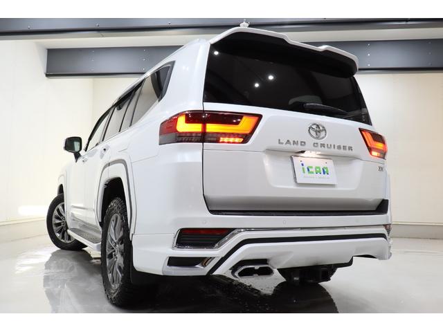 ランドクルーザー ＺＸ　ムーンルーフ　ＪＢＬプレミアムサウンドシステム　リアエンターテイメント　パノラミックビューモニター　ＣＯＯＬＢＯＸ　電動リアデフロック　革シート　モデリスタエアロ　ジオランダーＸＡＴタイヤ　寒冷地仕様（15枚目）