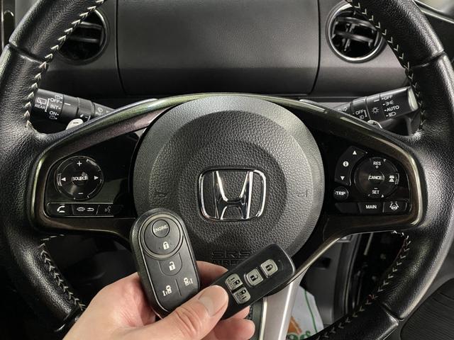 N-BOXカスタム G・Lターボホンダセンシング 4WD D保証 2年車検(付)・ホンダセンシング・純正ナビ・TV・CD/DVD/BT・Bカメラ・スマートキー・Wパワスラ・レーダークルコン・ETC・パドルシフト・シートヒーター・Pスタート・純正エアロ(29枚目)
