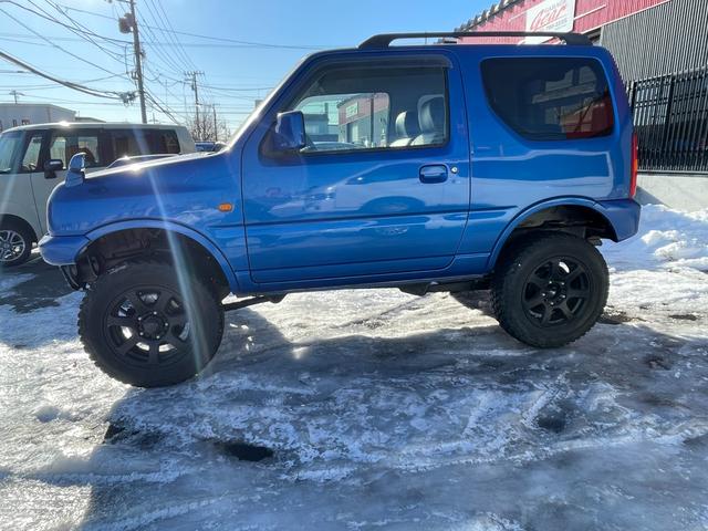 ジムニー ＸＣ　４ＷＤ．リフトアップ．社外Ｆ／Ｒバンパー（7枚目）