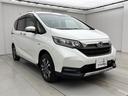 フリード+ハイブリッド ハイブリッド・クロスターホンダセンシング LEDヘッドライト 両側電動スライドドア クルーズコントロール シートヒータ 純正ナビ バックカメラ エンジンスターター ETC ドライブレコーダー(前後) 中古車画像_3