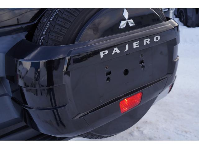 パジェロ ロング　エクシード　社外ナビフルセグ地デジ・バックカメラ・黒革シート・パワーシート・シートヒーター・ＬＥＤフォグ・社外１７アルミ・コンビステアリング・クルコン・ＡＣ１００Ｖ・ＥＴＣ・リアヒーター・寒冷地仕様・本州仕入（13枚目）
