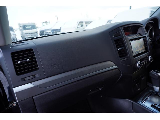 パジェロ ロング　エクシード　社外ナビフルセグ地デジ・バックカメラ・黒革シート・パワーシート・シートヒーター・ＬＥＤフォグ・社外１７アルミ・コンビステアリング・クルコン・ＡＣ１００Ｖ・ＥＴＣ・リアヒーター・寒冷地仕様・本州仕入（22枚目）