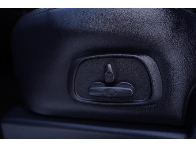 パジェロ ロング　エクシード　社外ナビフルセグ地デジ・バックカメラ・黒革シート・パワーシート・シートヒーター・ＬＥＤフォグ・社外１７アルミ・コンビステアリング・クルコン・ＡＣ１００Ｖ・ＥＴＣ・リアヒーター・寒冷地仕様・本州仕入（24枚目）