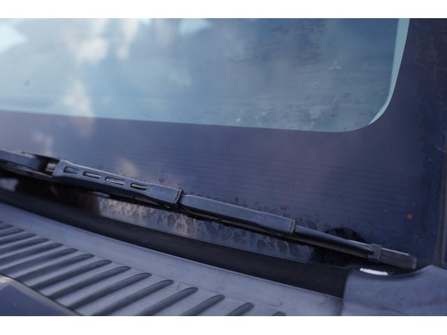 パジェロ ロング　エクシード　社外ナビフルセグ地デジ・バックカメラ・黒革シート・パワーシート・シートヒーター・ＬＥＤフォグ・社外１７アルミ・コンビステアリング・クルコン・ＡＣ１００Ｖ・ＥＴＣ・リアヒーター・寒冷地仕様・本州仕入（48枚目）