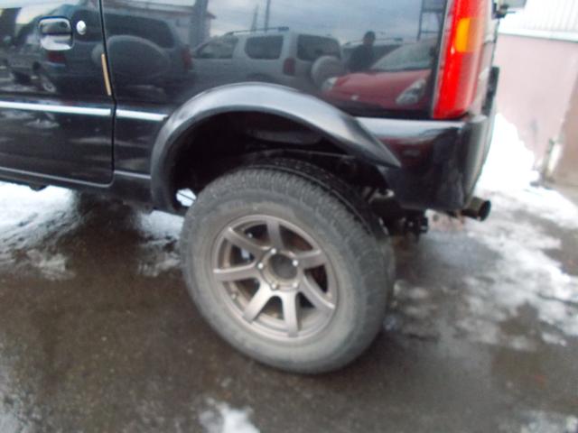 ジムニー ワイルドウインド　４ＷＤ　ターボ　リフトＵＰ　オーバーフェンダー　前後社外バンパー　社外マフラー　キーレス　エンジンスターター　シートヒーター　ミラーヒーター　フォグランプ　タイミングチェーン（9枚目）