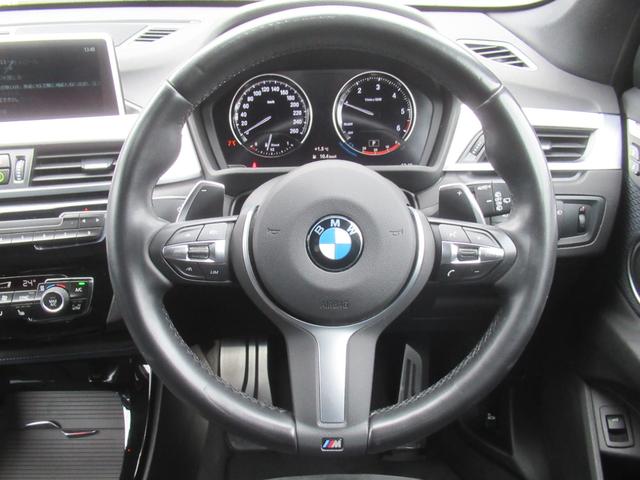 Ｘ１ ｘＤｒｉｖｅ　１８ｄ　Ｍスポーツ　冬タイヤ付き　パノラマサンルーフ　シートヒーター　ヘッドアップディスプレイ　電動テールゲート　アダプティブクルーズコントロール　レーンキープアシスト　純正ナビ　Ｂｌｕｅｔｏｏｔｈ　ＥＴＣ　１８インチ（7枚目）