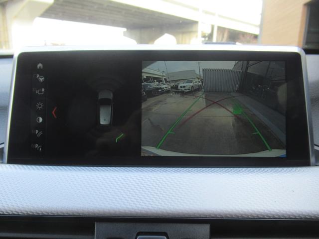 Ｘ１ ｘＤｒｉｖｅ　１８ｄ　Ｍスポーツ　冬タイヤ付き　パノラマサンルーフ　シートヒーター　ヘッドアップディスプレイ　電動テールゲート　アダプティブクルーズコントロール　レーンキープアシスト　純正ナビ　Ｂｌｕｅｔｏｏｔｈ　ＥＴＣ　１８インチ（12枚目）