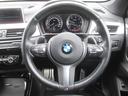 Ｘ１ ｘＤｒｉｖｅ　１８ｄ　Ｍスポーツ　冬タイヤ付き　パノラマサンルーフ　シートヒーター　ヘッドアップディスプレイ　電動テールゲート　アダプティブクルーズコントロール　レーンキープアシスト　純正ナビ　Ｂｌｕｅｔｏｏｔｈ　ＥＴＣ　１８インチ（7枚目）