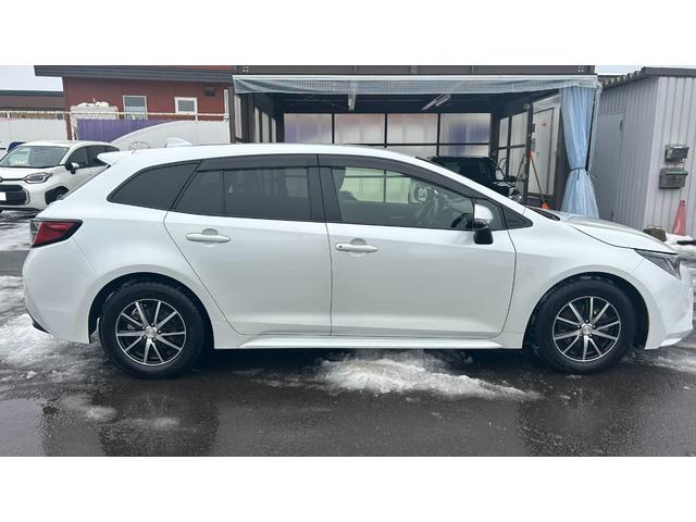 カローラツーリング ハイブリッド　ダブルバイビー５０ミリオンエディション　Ｅ－Ｆｏｕｒ　特別仕様車　ＴＳＳ　ディスプレイオーディオ　バックガイドモニター　ＥＴＣ　クルコン　スマートキー　純正エンスタ　ＬＥＤヘッドライト　ＢＳＭ　夏冬ＡＷ　ワンオーナー　寒冷地仕様（5枚目）