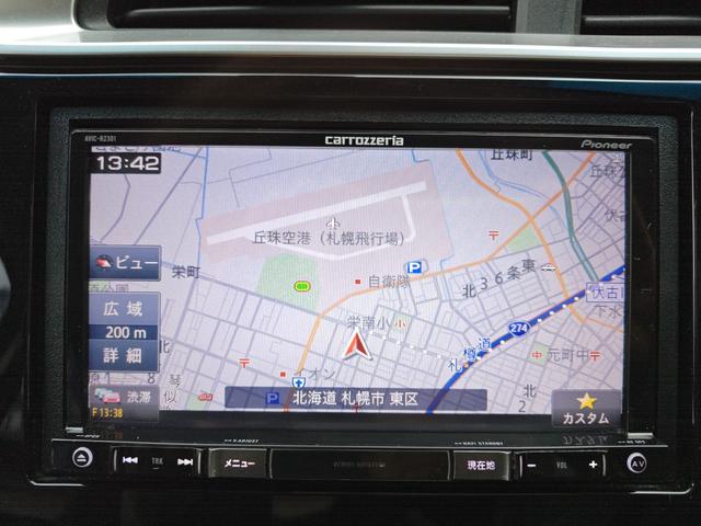 フィットハイブリッド Ｆ　４ＷＤ・オートマ・運転席・助手席エアバッグ・ＡＢＳ・アイドリングストップ車・ＥＴＣ・カーナビ・バックカメラ・クルーズコントロール・（8枚目）