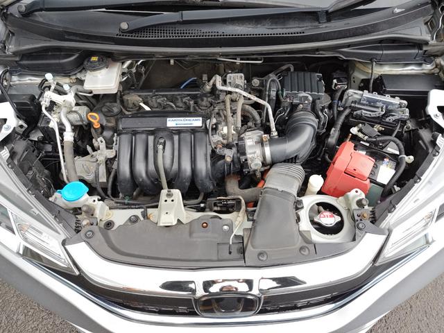 フィットハイブリッド Ｆ　４ＷＤ・オートマ・運転席・助手席エアバッグ・ＡＢＳ・アイドリングストップ車・ＥＴＣ・カーナビ・バックカメラ・クルーズコントロール・（17枚目）