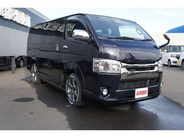 レジアスエースバン スーパーＧＬ　ダークプライムＩＩ　４ＷＤ　４１５ＣＯＢＲＡ　Ｓ－６ボンネット＆クリーンルック３Ｆリップ＆ステージ２ルーフスポイラー＆バッドラッカーＳＤ－６　１７インチＡＷ　両側パワースライドドア　ＥＴＣ　社外コンソールＢＯＸ（3枚目）