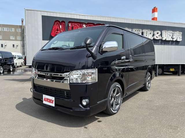 レジアスエースバン スーパーＧＬ　ダークプライムＩＩ　４ＷＤ　４１５ＣＯＢＲＡ　Ｓ－６ボンネット＆クリーンルック３Ｆリップ＆ステージ２ルーフスポイラー＆バッドラッカーＳＤ－６　１７インチＡＷ　両側パワースライドドア　ＥＴＣ　社外コンソールＢＯＸ（10枚目）