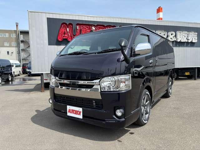 レジアスエースバン スーパーＧＬ　ダークプライムＩＩ　４ＷＤ　４１５ＣＯＢＲＡ　Ｓ－６ボンネット＆クリーンルック３Ｆリップ＆ステージ２ルーフスポイラー＆バッドラッカーＳＤ－６　１７インチＡＷ　両側パワースライドドア　ＥＴＣ　社外コンソールＢＯＸ（11枚目）