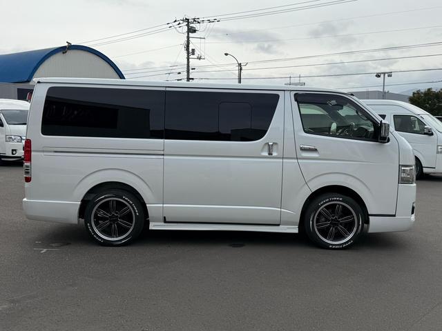 ハイエースバン スーパーGL ダークプライムII 4WD ワンオーナー 寒冷地仕様 パノラミックビューモニター デジタルインナーミラー 415COBRA CL-3フロントリップ CL-2サイドステップ CL-ステップリアバンパー バッドラッカー(4枚目)