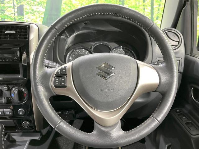 ジムニー ランドベンチャー 4WD ターボ 禁煙車 ハーフレザーシート シートヒーター ETC 純正16インチアルミ CD(11枚目)
